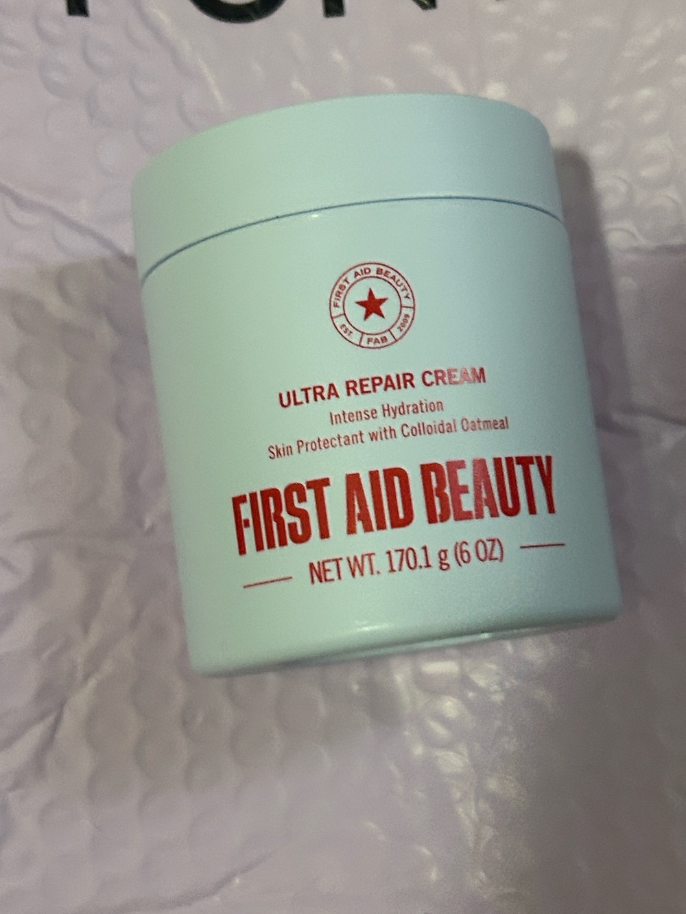 First Aid Beauty Ultra Repair Cream - Pale Blue Jar with Red Text